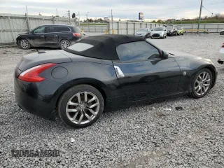 2014 Nissan 370Z Touring with VIN JN1AZ4FHXEM621358, listed as a Copart auction lot 84832164 with 65,441 mi miles and Salvage Title. Bid and sale history available at DreamBid. Image 3.