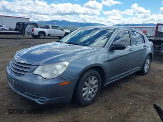 2010 Chrysler Sebring Touring with VIN 1C3CC4FB0AN116408, listed as a IAAI auction lot 42257350 with 145,501 mi miles and . Bid and sale history available at DreamBid. Image 2.