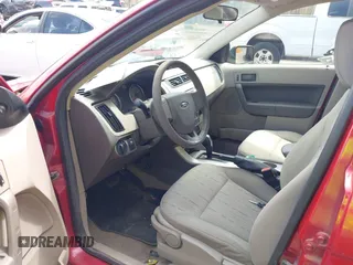 2009 Ford Focus SE with VIN 1FAHP35N89W243205, listed as a IAAI auction lot 42149989 with 148,058 mi miles. Bid and sale history available at carsss.com. Image 5.