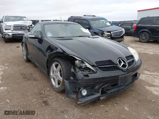 2006 Mercedes-Benz SLK-Class 3.5L with VIN WDBWK56FX6F084328, listed as a IAAI auction lot 41570145 with 104,929 mi miles. Bid and sale history available at carsss.com. Image 1.