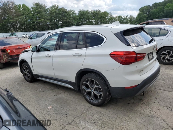 2019 BMW X1 xDrive28i with VIN WBXHT3C59K5L90317, listed as a Copart auction lot 61028125 with 46,789 mi miles and Salvage title. Bid and sale history available at DreamBid. Image 2.