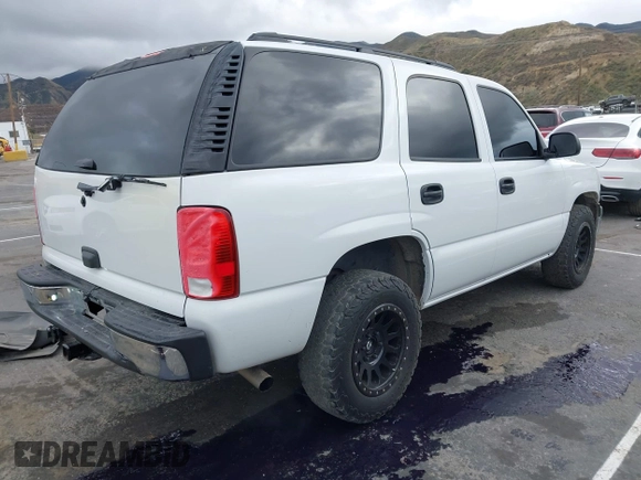 2005 Chevrolet Tahoe LS with VIN 1GNEC13V85J243672, listed as a IAAI auction lot 41801268 with 202,624 mi miles and . Bid and sale history available at DreamBid. Image 4.