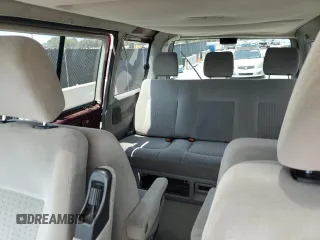 1999 Volkswagen EuroVan с VIN WV2MH2703XH045037, выставлен на аукционе Copart как лот 57109265 с пробегом 265 855 миль миль и Списание • Salvage title. История ставок и продаж доступна на DreamBid. Изображение 10.