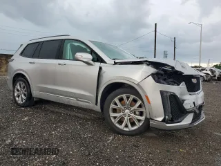 2020 Cadillac XT6 AWD Sport with VIN 1GYKPGRSXLZ217891, listed as a Copart auction lot 67915354 with 34,143 mi miles and Salvage Title. Bid and sale history available at carsss.com. Image 4.