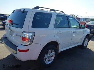 2009 Mercury Mariner Hybrid with VIN 4M2CU29399KJ05674, listed as a IAAI auction lot 40843807 with 194,987 mi miles. Bid and sale history available at carsss.com. Image 4.