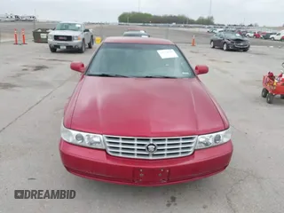 2001 Cadillac Seville z VIN 1G8KS54Y91U227846, wystawiony jako IAAI lot #42134095 z przebiegiem 216 766 mil mil oraz . Historia ofert i sprzedaży dostępna na DreamBid. Obrazek 12.