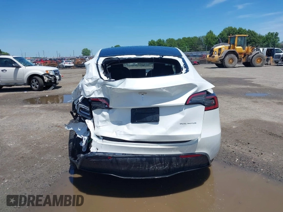 2023 Tesla Model Y Long Range z VIN 7SAYGDEE9PF753051, wystawiony jako IAAI lot #39615839 z przebiegiem Nie podano mil oraz . Historia ofert i sprzedaży dostępna na DreamBid. Obrazek 15.