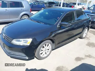 2015 Volkswagen Jetta Sedan 1.8T SE with VIN 3VWD17AJ6FM235908, listed as a IAAI auction lot 42015028 with 178,814 mi miles. Bid and sale history available at carsss.com. Image 2.