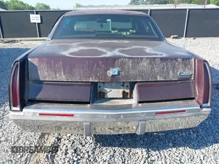 1996 Cadillac Fleetwood z VIN 1G6DW52PXTR713787, wystawiony jako IAAI lot #42079864 z przebiegiem Nie podano mil oraz . Historia ofert i sprzedaży dostępna na DreamBid. Obrazek 15.
