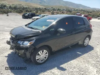 2015 Honda Fit LX z VIN 3HGGK5H52FM759746, wystawiony jako Copart lot #60486535 z przebiegiem 64 295 mil mil oraz Szkoda całkowita • Salvage title. Historia ofert i sprzedaży dostępna na DreamBid. Obrazek 2.