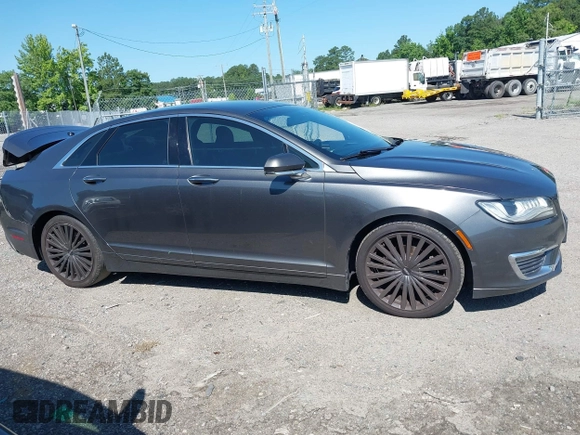 2017 Lincoln MKZ Reserve z VIN 3LN6L5E98HR653592, wystawiony jako IAAI lot #42531248 z przebiegiem 114 188 mil mil oraz . Historia ofert i sprzedaży dostępna na DreamBid. Obrazek 13.