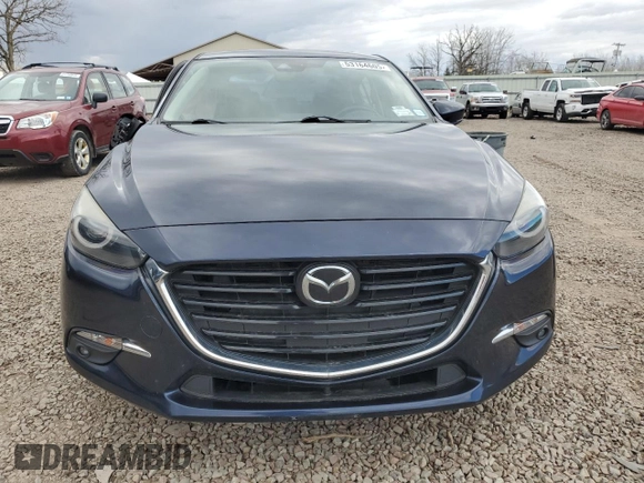 2018 Mazda 3 Grand Touring z VIN 3MZBN1W38JM190398, wystawiony jako Copart lot #53164605 z przebiegiem 74 845 mil mil oraz Szkoda całkowita • Salvage title. Historia ofert i sprzedaży dostępna na DreamBid. Obrazek 5.