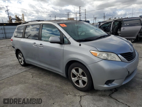 2011 Toyota Sienna LE AAS with VIN 5TDKK3DC3BS112395, listed as a Copart auction lot 48169005 with 179,801 mi miles and Salvage Title. Bid and sale history available at DreamBid. Image 4.