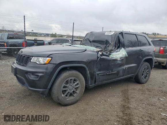 2018 Jeep Grand Cherokee Laredo E with VIN 1C4RJFAG8JC457884, listed as a Copart auction lot 50303215 with Not Provided miles and Salvage Title. Bid and sale history available at DreamBid. Image 1.