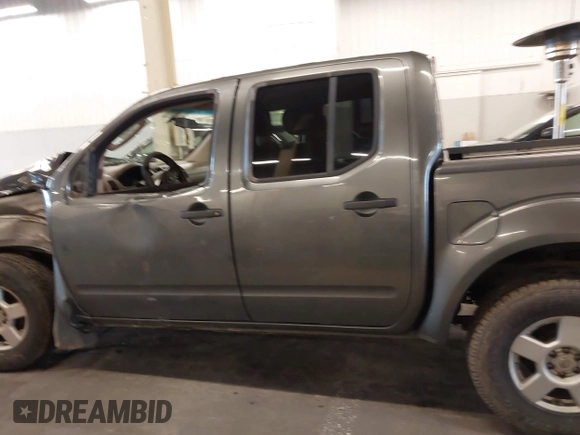 2005 Nissan Frontier LE with VIN 1N6AD07W95C451921, listed as a IAAI auction lot 40952064 with 234,900 mi miles and . Bid and sale history available at DreamBid. Image 14.