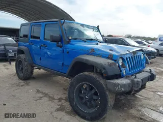 2015 Jeep Wrangler Unlimited Rubicon with VIN 1C4BJWFG5FL558348, listed as a IAAI auction lot 41460025 with 106,012 mi miles. Bid and sale history available at carsss.com. Image 1.