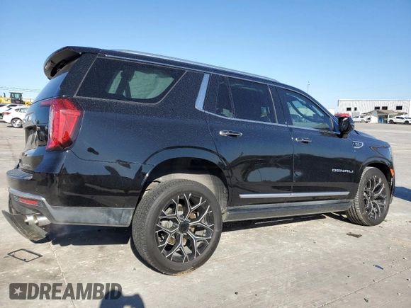 2021 GMC Yukon Denali with VIN 1GKS2DKL1MR329183, listed as a Copart auction lot 48513004 with 50,231 mi miles. Bid and sale history available at carsss.com. Image 3.