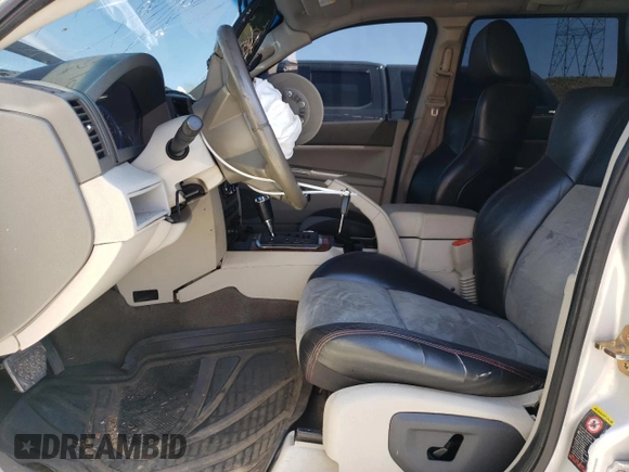 2005 Jeep Grand Cherokee Limited with VIN 1J8HR58235C704767, listed as a Copart auction lot 54436665 with 114,430 mi miles and Salvage title. Bid and sale history available at DreamBid. Image 7.