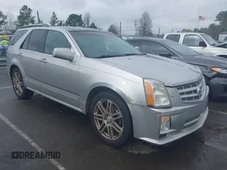2007 Cadillac SRX with VIN 1GYEE637470168781, listed as a IAAI auction lot 41876860 with 170,028 mi miles. Bid and sale history available at carsss.com. Image 1.
