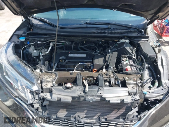 2015 Honda CR-V LX with VIN 2HKRM4H38FH601802, listed as a IAAI auction lot 42177101 with 71,775 mi miles and . Bid and sale history available at DreamBid. Image 10.