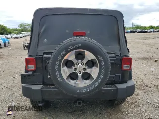 2016 Jeep Wrangler Unlimited Sahara with VIN 1C4BJWEG8GL150249, listed as a Copart auction lot 57574525 with 104,206 mi miles and Salvage title. Bid and sale history available at DreamBid. Image 6.