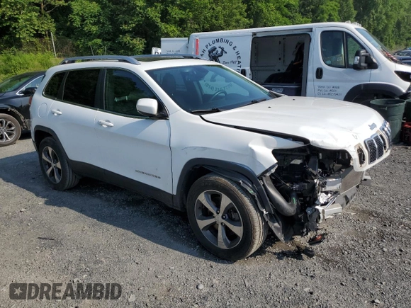 2019 Jeep Cherokee Limited with VIN 1C4PJMDX1KD293624, listed as a Copart auction lot 61102005 with 57,321 mi miles and Salvage title. Bid and sale history available at DreamBid. Image 4.