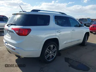 2017 GMC Acadia Denali with VIN 1GKKNXLS0HZ300763, listed as a IAAI auction lot 42035101 with 65,312 mi miles and . Bid and sale history available at carsss.com. Image 4.
