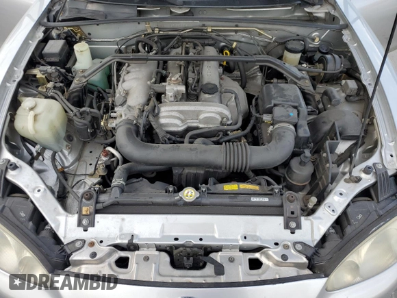 2001 Mazda MX-5 Miata z VIN JM1NB353510208400, wystawiony jako Copart lot #54516515 z przebiegiem 148 198 mil mil oraz Czysty tytuł • Clean title. Historia ofert i sprzedaży dostępna na DreamBid. Obrazek 11.