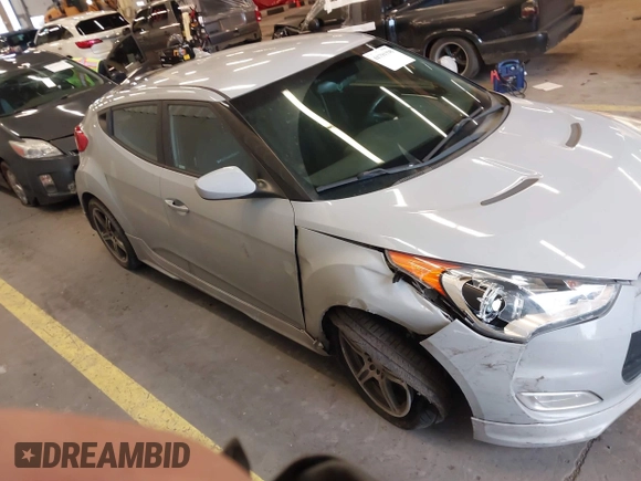 2013 Hyundai Veloster w/Black Int with VIN KMHTC6AD2DU128534, listed as a IAAI auction lot 41791398 with 158,414 mi miles and . Bid and sale history available at DreamBid. Image 13.
