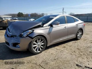 2013 Hyundai Azera z VIN KMHFH4JG2DA251670, wystawiony jako Copart lot #45040885 z przebiegiem 146 802 mil mil oraz Szkoda całkowita • Salvage title. Historia ofert i sprzedaży dostępna na DreamBid. Obrazek 1.