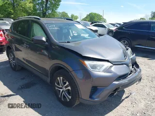 2016 Toyota RAV4 LE with VIN JTMZFREV7GJ086149, listed as a IAAI auction lot 42064251 with 90,104 mi miles and . Bid and sale history available at DreamBid. Image 1.