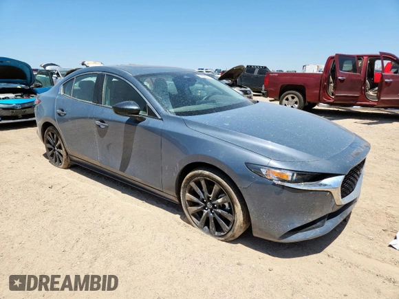 2024 Mazda 3 S Carbon Edition z VIN 3MZBPBCM8RM413340, wystawiony jako Copart lot #61095745 z przebiegiem 21 870 mil mil oraz Szkoda całkowita • Salvage title. Historia ofert i sprzedaży dostępna na DreamBid. Obrazek 4.