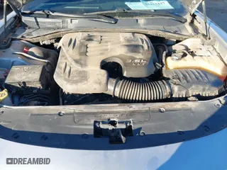 2016 Dodge Charger SXT with VIN 2C3CDXJG8GH281884, listed as a IAAI auction lot 41413437 with 115,548 mi miles. Bid and sale history available at carsss.com. Image 10.