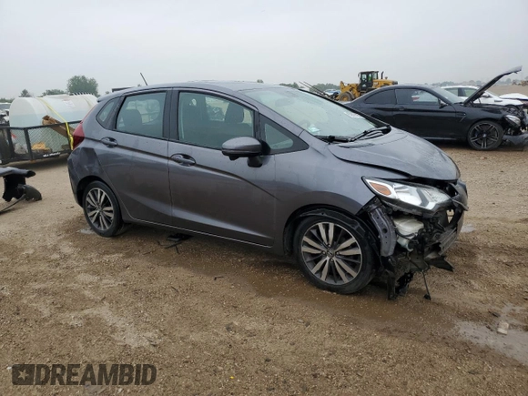 2015 Honda Fit EX-L z VIN 3HGGK5H85FM763929, wystawiony jako Copart lot #60808125 z przebiegiem 79 441 mil mil oraz Szkoda całkowita • Salvage title. Historia ofert i sprzedaży dostępna na DreamBid. Obrazek 4.