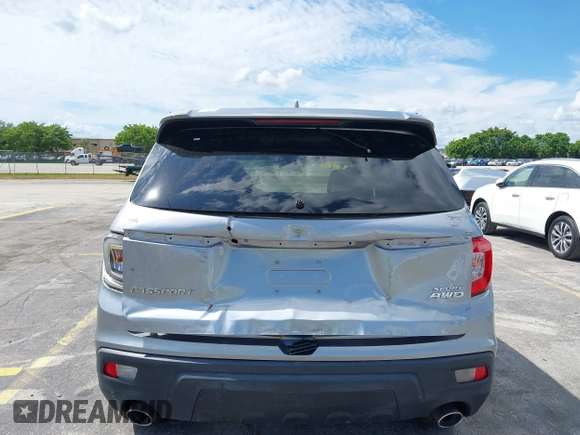 2021 Honda Passport Sport with VIN 5FNYF8H24MB004016, listed as a IAAI auction lot 41696379 with 85,373 mi miles and . Bid and sale history available at DreamBid. Image 6.