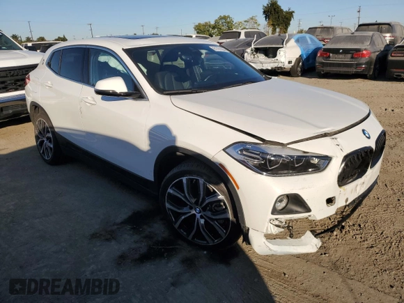 2020 BMW X2 xDrive28i with VIN WBXYJ1C02L5P85780, listed as a Copart auction lot 81761284 with 14,451 mi miles and Salvage Title. Bid and sale history available at carsss.com. Image 4.