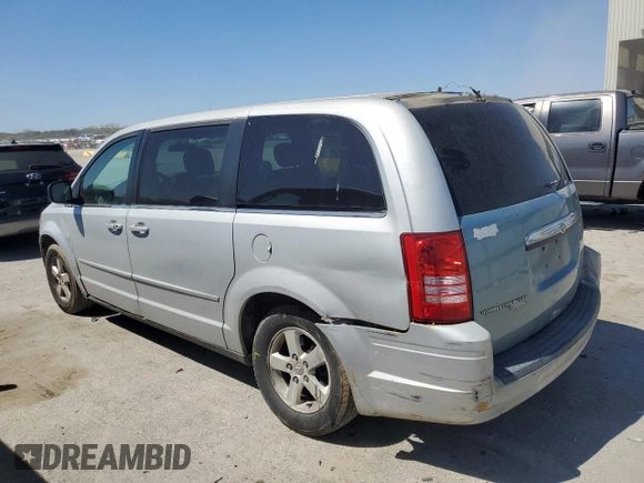 2009 Chrysler Town & Country LX with VIN 2A8HR44E39R525345, listed as a Copart auction lot 53158825 with 279,595 mi miles and Salvage Title. Bid and sale history available at DreamBid. Image 2.