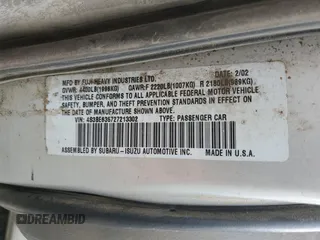2002 Subaru Legacy L with VIN 4S3BE635727213302, listed as a Copart auction lot 58575235 with 243,886 mi miles and Salvage title. Bid and sale history available at DreamBid. Image 12.