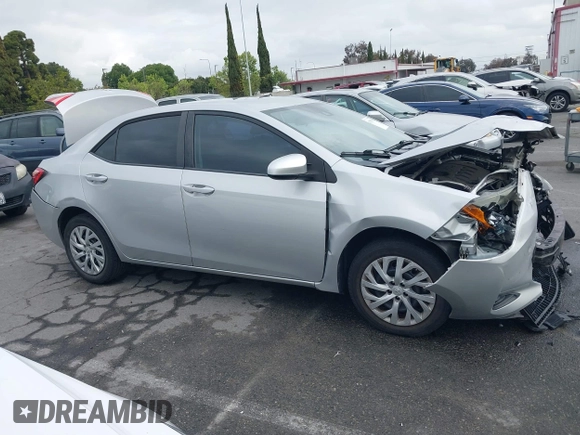 2019 Toyota Corolla L with VIN 5YFBURHE4KP929909, listed as a IAAI auction lot 42078797 with 131,741 mi miles. Bid and sale history available at carsss.com. Image 14.