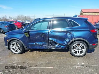 2015 Lincoln MKC with VIN 5LMTJ2AH2FUJ12531, listed as a IAAI auction lot 41639903 with 112,835 mi miles. Bid and sale history available at carsss.com. Image 14.