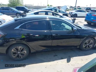 2018 Honda Civic EX z VIN SHHFK7H57JU230455, wystawiony jako IAAI lot #42328392 z przebiegiem 86 867 mil mil oraz . Historia ofert i sprzedaży dostępna na DreamBid. Obrazek 13.