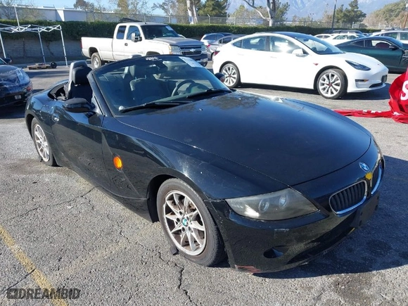 2004 BMW Z4 2.5i with VIN 4USBT33554LS52477, listed as a IAAI auction lot 41120153 with NaN miles. Bid and sale history available at carsss.com. Image 1.