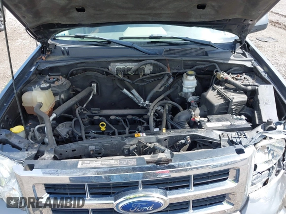 2009 Ford Escape XLS z VIN 1FMCU02709KC11692, wystawiony jako IAAI lot #42202890 z przebiegiem 155 243 mil mil oraz . Historia ofert i sprzedaży dostępna na DreamBid. Obrazek 10.