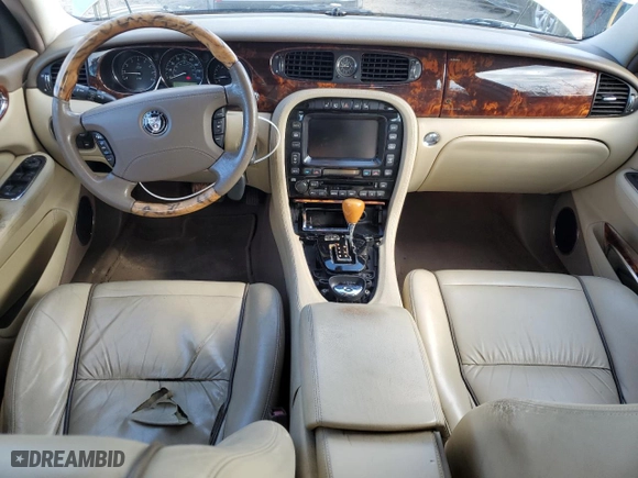 2007 Jaguar XJ with VIN SAJWA79B27SH17894, listed as a Copart auction lot 73415074 with 102,672 mi miles and Clean Title. Bid and sale history available at carsss.com. Image 8.
