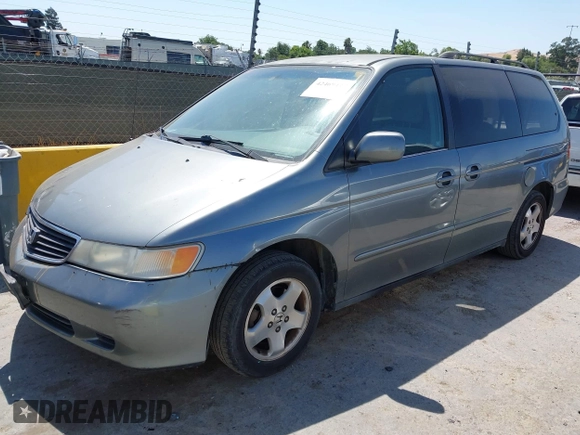 2001 Honda Odyssey EX z VIN 2HKRL18621H541553, wystawiony jako IAAI lot #42469447 z przebiegiem 241 701 mil mil oraz . Historia ofert i sprzedaży dostępna na DreamBid. Obrazek 2.