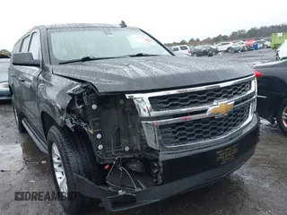 2019 Chevrolet Suburban LS with VIN 1GNSCGKC5KR321327, listed as a IAAI auction lot 41069977 with 282,308 mi miles and . Bid and sale history available at DreamBid. Image 6.