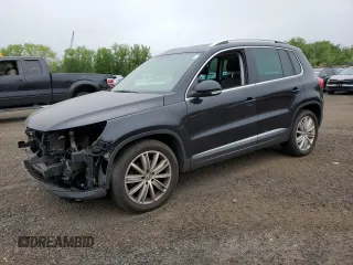 2013 Volkswagen Tiguan SE z VIN WVGBV7AX6DW550316, wystawiony jako Copart lot #56964595 z przebiegiem 157 526 mil mil oraz Szkoda całkowita • Salvage title. Historia ofert i sprzedaży dostępna na DreamBid. Obrazek 1.