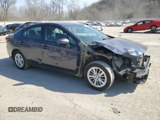 2017 Subaru Impreza Premium with VIN 4S3GKAD65H3605381, listed as a Copart auction lot 48922895 with 121,874 mi miles and Salvage title. Bid and sale history available at DreamBid. Image 4.
