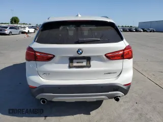 2019 BMW X1 xDrive28i with VIN WBXHT3C53K5L35670, listed as a Copart auction lot 53493245 with 14,201 mi miles and Salvage Title. Bid and sale history available at carsss.com. Image 6.