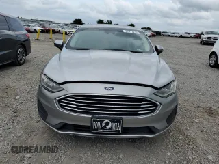2020 Ford Fusion SE with VIN 3FA6P0HDXLR113882, listed as a Copart auction lot 57677215 with 104,459 mi miles and Salvage title. Bid and sale history available at DreamBid. Image 5.